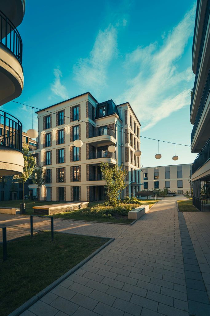 A modern apartment building with balconies and walkways